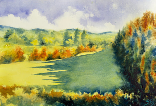 Gatton Park, Reigate, the watercolour painting with a green field, warm yellow and orange trees, distant hills and a dark tree on the right.
